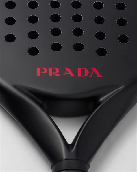 Prada genuine tennis racket with racket cover, 3 tennis balls in a .